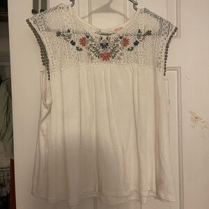 white patterned flowy blouse